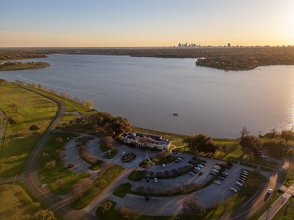 White Rock Lake with the Bath House Cultural Center and the Dallas skyline